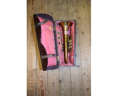 An old brass cornet, stamped C Mahillon & Co, in wood box. 