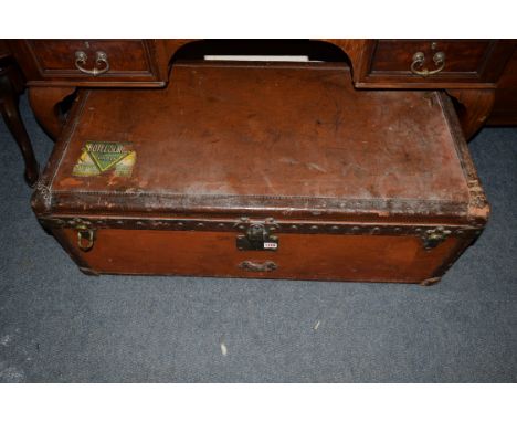A vintage Louis Vuitton canvas and leather trunk, the interior with removable tray, pasted label and stamped No.207981, 37cm 
