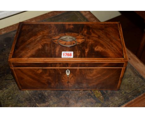 A George III figured mahogany and inlaid tea caddy, 32.5cm wide, with void interior. 