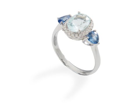 An aquamarine, sapphire and diamond cluster ring claw-set with an oval-cut aquamarine, in a border of round brilliant-cut dia
