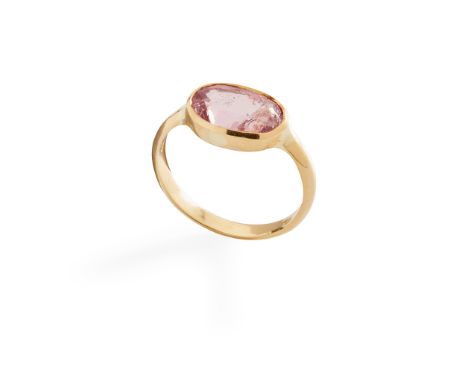 A pink spinel ring collet-set with an oval-cut pink spinel, to a plain band, modelled in 18ct gold(Ring size: K/L)