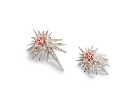 A pair of ruby and diamond star brooches each modelled as a starburst, set throughout with round-cut rubies and diamonds, unm