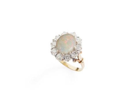 An opal and diamond cluster ring claw-set with an oval opal cabochon, in a single border of ten round brilliant-cut diamonds,