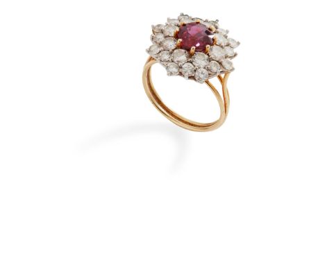 A ruby and diamond cluster ring claw-set with a round-cut ruby in a double border of round brilliant-cut diamonds, unmarked(R