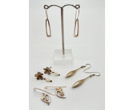 4 pairs of silver and white metal drop style earrings. To include heart shaped Celtic design and flowers with natural pearls.