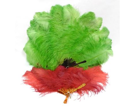 1920s Green Ostrich Feather Fan, shaded to a light green on the tips; together with a 1920s Cerise Pink Ostrich Feather Fan, 