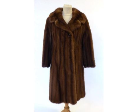 Calman Links London Light Brown Mink Coat, with attached belt to reverse36'' bust, 14'' underarm to cuff, 37'' shoulder to he