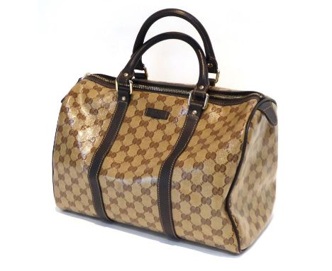 Gucci 'Boston' Bag, in light brown patent leather, patterned with the 'GG' repeat pattern and trimmed in dark brown leather, 
