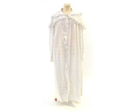 Late 19th Century Ladies Shawl Collared Peignoir, in a self-patterned white cotton checked design, double layered and frilled