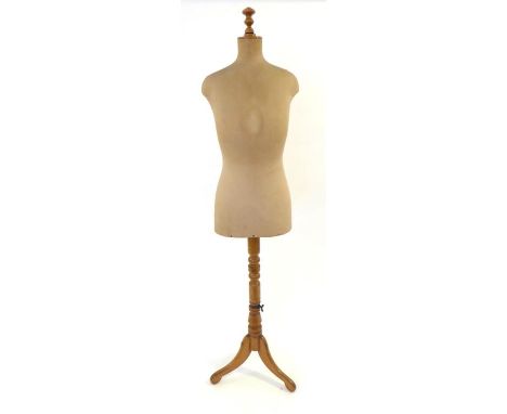 A Harris and Sheldon Limited Mannequin, on an oak tripod adjustable base, 165cm