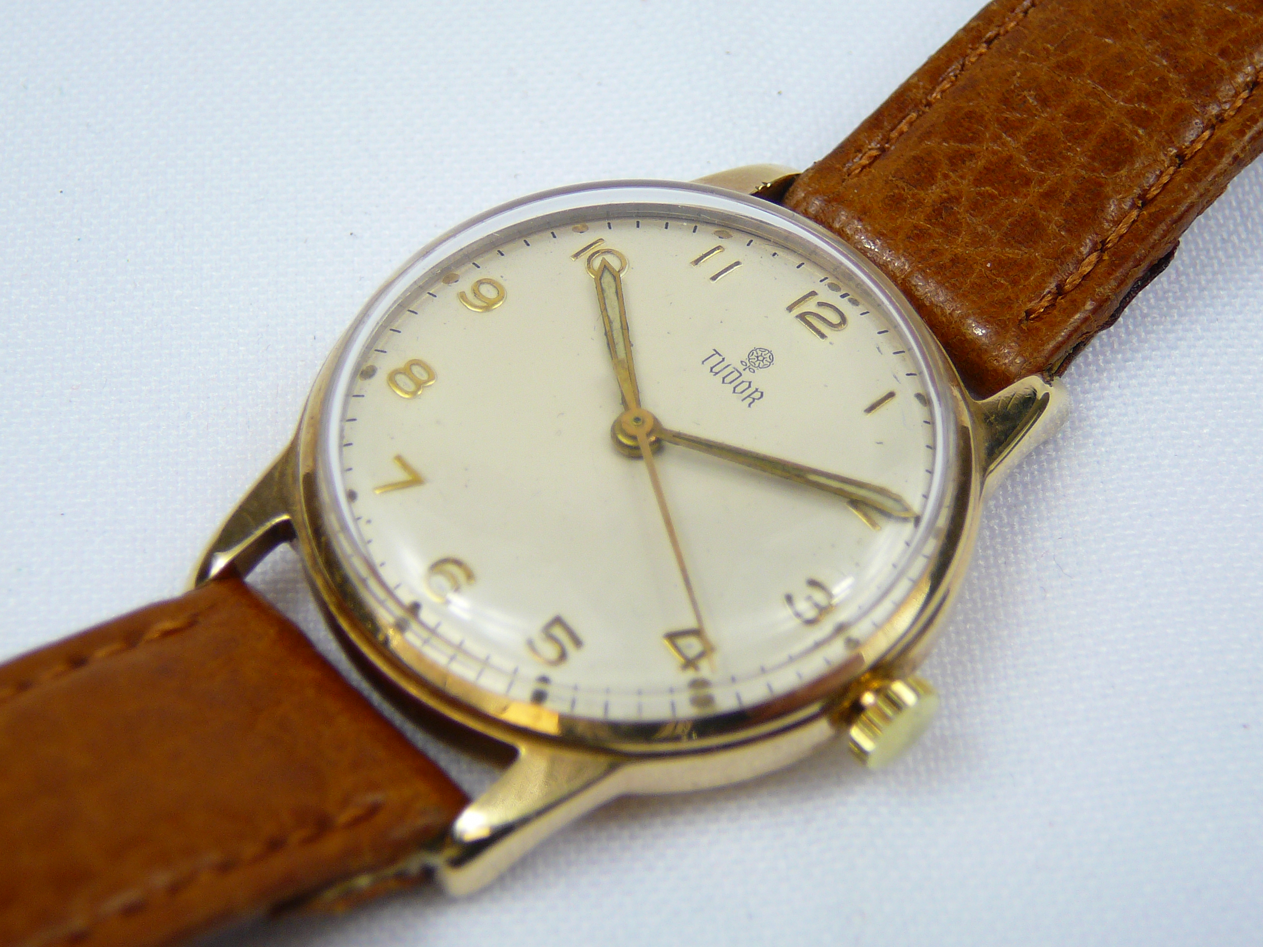 Gents 9ct gold Tudor vintage wrist watch (30mm) on brown leather strap, signed silvered dial with