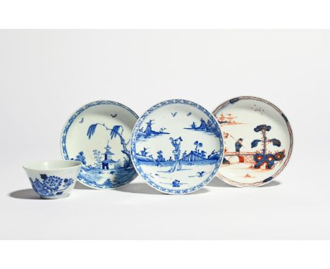 Three Vauxhall saucers and a teabowl  c.1755-60, one painted in underglaze blue with a Chinese figure walking in an island la