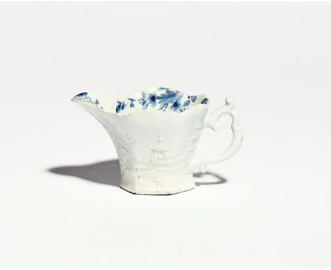 A rare Worcester blue and white 'Wigornia' creamboat  c.1752-55,  the hexagonal form moulded to the exterior with a line of t