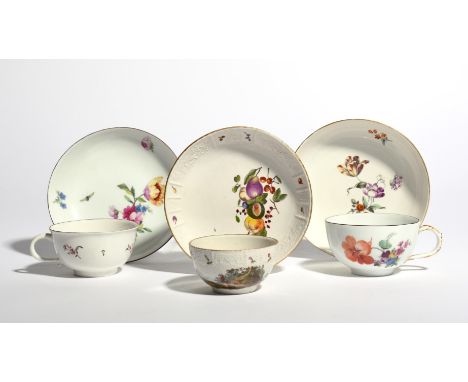 Two German porcelain cups and saucers  c.1760, one Höchst and painted with loose flower sprays, the other Berlin and painted 