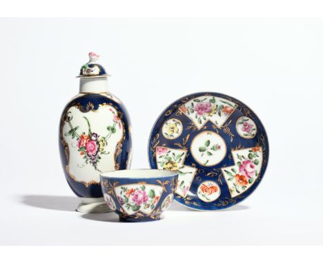 A small Worcester tea canister and cover  c.1770, the ovoid form painted with panels of flower garlands within shaped panels 