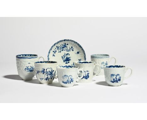 Five Worcester blue and white coffee cups  c.1758-62, variously moulded with floral panels, vertical fluting and feather moul