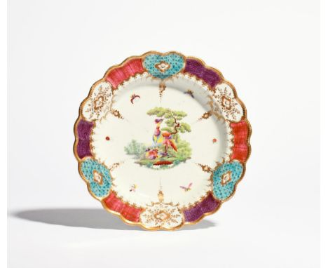A Worcester dessert plate from the Mrs Arthur James service  c.1780, decorated in the Sèvres style with fancy birds beneath a