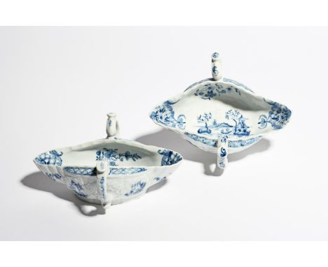 A pair of Worcester blue and white double-ended sauceboats c.1758-60, the interiors painted with the Two-Handled Sauceboat La
