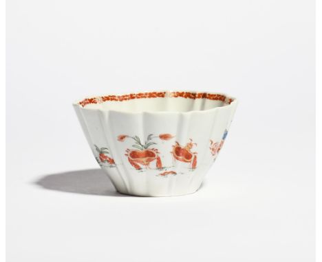 A rare Worcester fluted bowl c.1755-60, the flared form moulded with wide and narrow flutes, painted with the Red Crabs patte