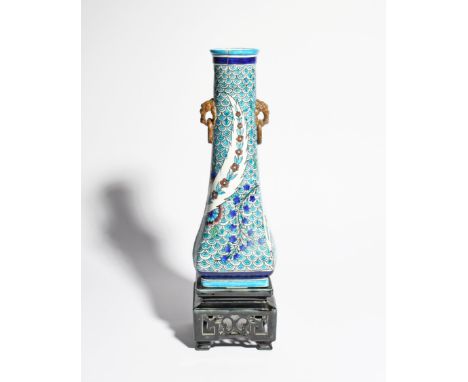 A Samson pottery Iznik-style vase  late 19th century, the tall slender form painted with patterned saz leaves and flowering b