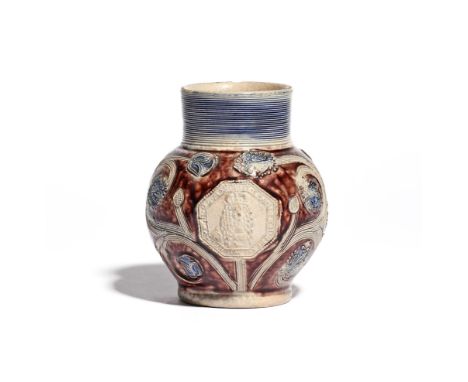 A Westerwald stoneware Royal jug c.1690, applied with an octagonal portrait plaque of King William III, titled around the por