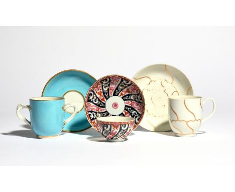 Two Worcester cups and saucers  c.1775, one a large coffee cup and saucer decorated in the Queen's pattern with gilt compartm