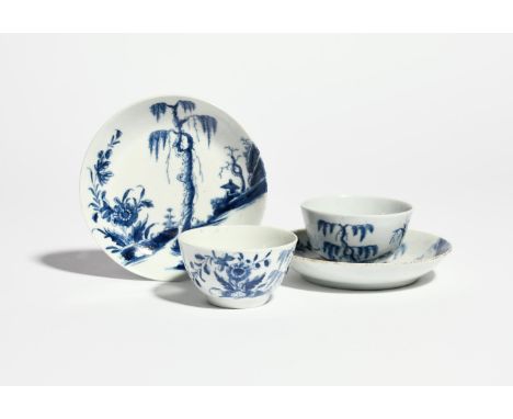 Two Worcester blue and white teabowls and saucers  c.1756-58, painted with the Landslip pattern, a tall fringed tree before a