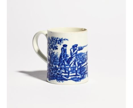 A small Worcester blue and white mug  c.1780, printed with a version of the Man Aiming a Gun print, the barrel pointing into 