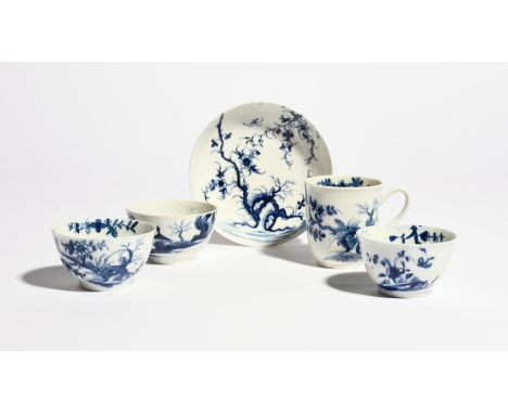 A Worcester blue and white trio  .1755-60, comprising a coffee cup, teabowl and saucer, painted with the Prunus Root pattern,