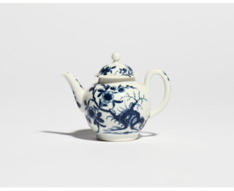 A good miniature Worcester blue and white teapot and cover  c.1760-65, painted with the Prunus Root pattern, one side with th