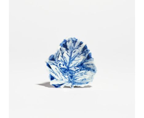 A Vauxhall blue and white pickle leaf dish c.1755-58, of small leaf shape with serrated edge, painted with a moth amidst heav