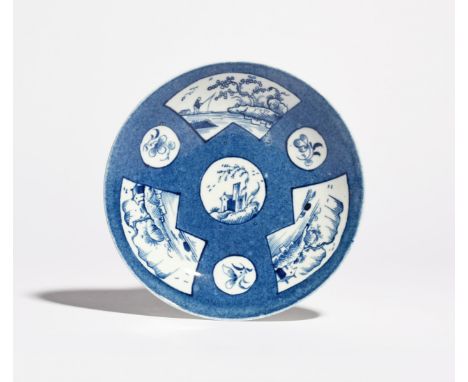 A Worcester blue and white saucer dish c.1770-75, painted with the Fisherman in a Fan-Panelled Landscape pattern, a Chinese f