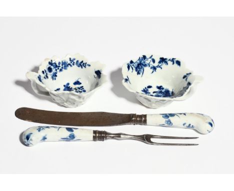 A pair of Worcester cutlery handles  c.1758-60, of pistol grip form, painted with the Rose and Floral Spray pattern, with a s