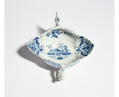 A large Worcester blue and white two-handled sauceboat c.1755, painted in the Two-Handled Sauceboat Landscape pattern with pa