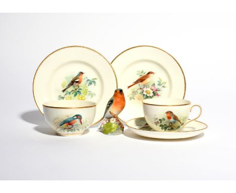 A Royal Worcester part tea service  date codes for 1937, comprising a tea cup and saucer, two small plates and a sugar bowl, 