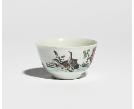 A rare Worcester teabowl c.1756-60, printed in black then hand-coloured in famille rose enamels with two geese standing besid