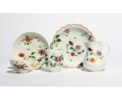 A Worcester trio  c.1760, comprising a coffee cup, teabowl and saucer, painted with the Hibiscus pattern, and a small two-han