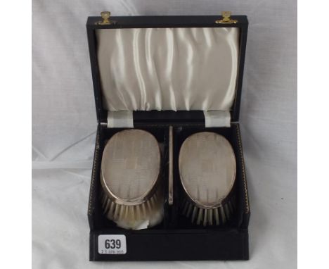Pair of boxed plain hair brushes and a comb