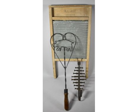 A Vintage Acme Washboard, Novelty Carpet Beater with Pig Decoration and a Centipede Wall Hanging Candlestick 