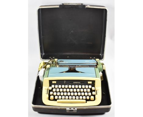 A Vintage Imperial Portable Manual Typewriter in Briefcase 