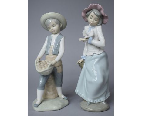 Two Nao Figures, Boy with Basket of Eggs and Girl with Dove, Latter 24cm high 