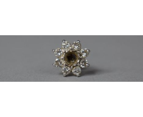 A Single Seven Diamond and White Metal Earring (Missing Centre Stone) 