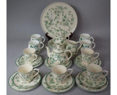 A Collection of Ivy Patterned Teawares to comprise Teapot, Mugs, Jug, Lidded Sugar, Saucers, Side Plates, Cake Plate, Bowls E