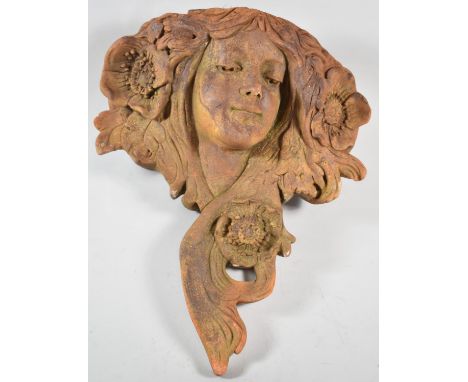 A Cast Terracotta Wall Hanging Garden Planter in the Form of an Art Nouveau Maiden, 40cm high 