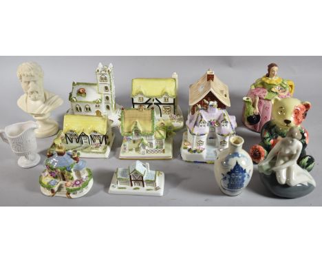 A Collection of Eight Coalport Cottages, Crinoline Lady Teapot, Country Artist Inspiration Bear, German Little Mermaid, Paria