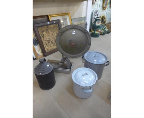 A shield shaped fire screen, metal trays, two enamelled pots and another 