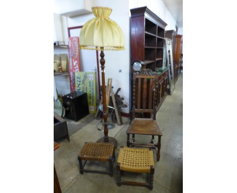 An oak standard lamp, a carved oak side chair and two stools 
