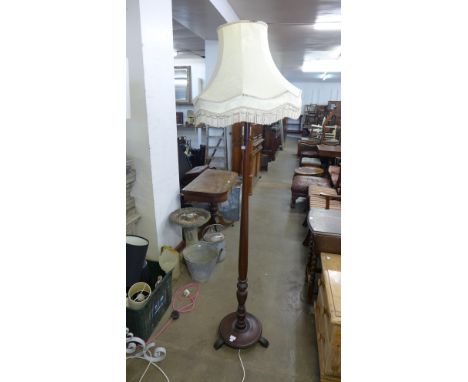 A mahogany standard lamp 