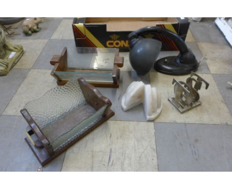 A vintage Bakelite table lamp, two fruit bowls, a pair of Art Deco alabaster book ends and a toast rack 