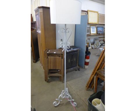 A painted metal standard lamp 